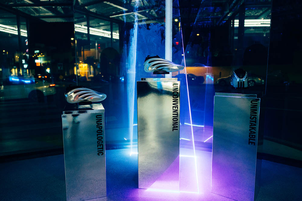 Adidas Harden Vol. 9 - Shoe display on chrome pedestal with neon lighting